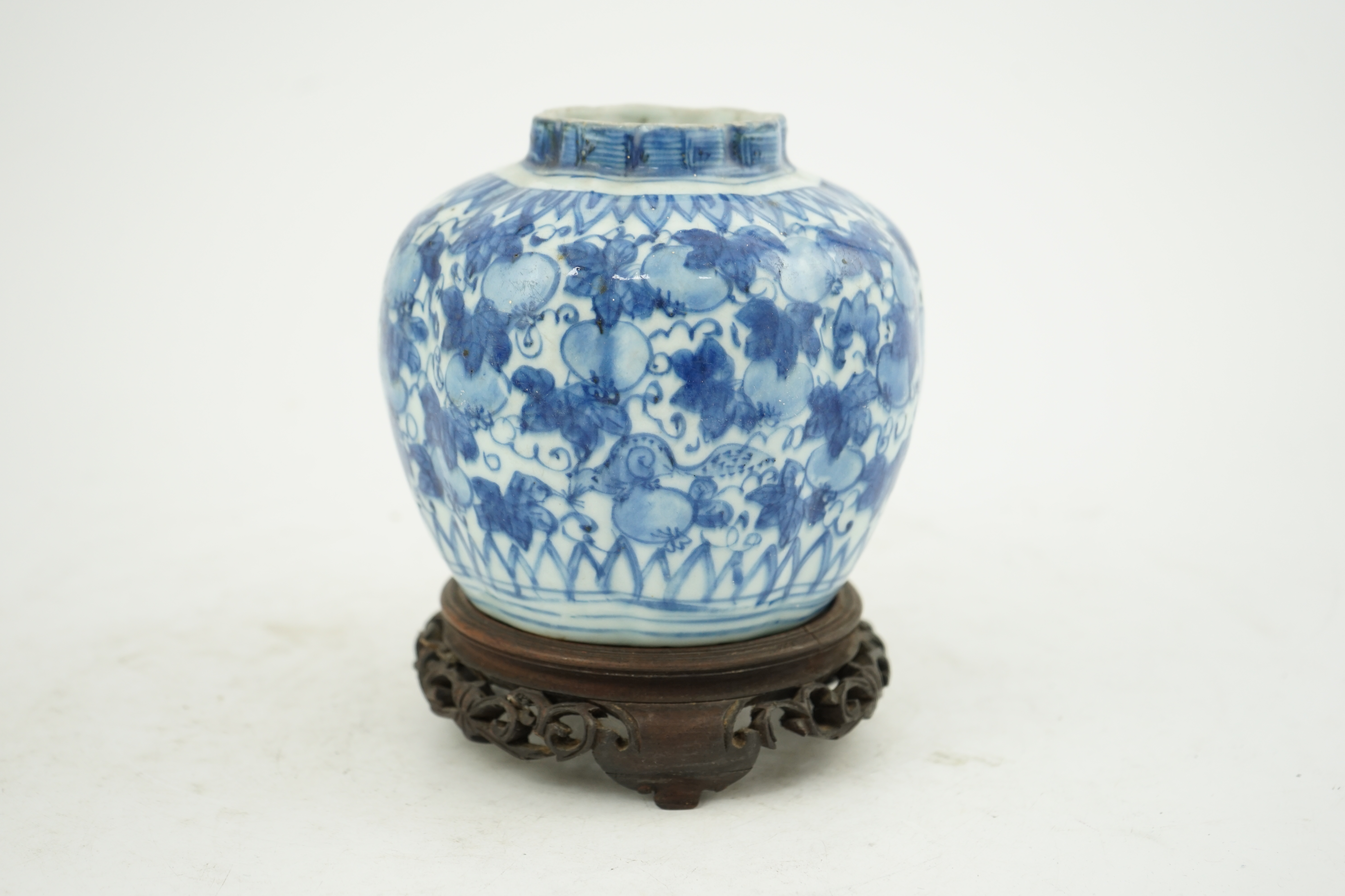 A Chinese blue and white ‘squirrel and vine’ melon-shaped jar, Wanli period (1572-1620)